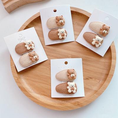 China Hot Selling Lovely Little Kids Winter Fashion Hair Ornaments Mini Bear Hairpins Bb Korean Bangs Clips For Girls Children for sale