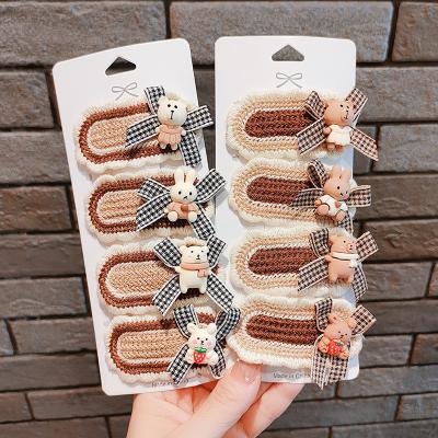 China Cute Fashion Winter Coffee Color Cartoon Bowknot Hairpin Bear Kids Knitting Hair Clips For Girls Lovely Animal Hair Accessories for sale