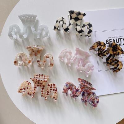 China Korean Hair Accessories Ins Fashion Hair Accessories Girls Wave Shaped Large Acetate Hair Claw Clip Medium Hollow Women Claw Hair Clips for sale