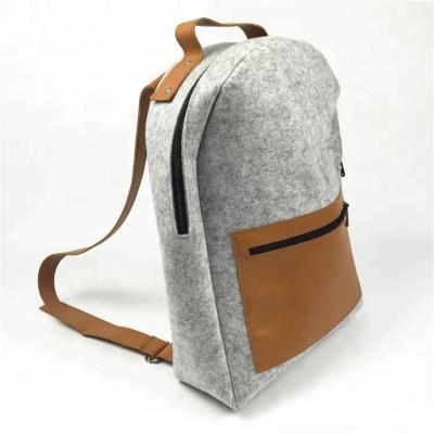 China Easy To Carry Laser Cut Fashionable Custom Logo Korea Style Felt Backpack Free Bag For College Student for sale