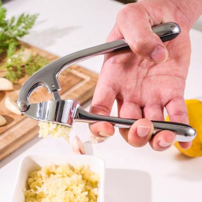 China Viable Professional Kitchen Instruments KOBACH Garlic Press KOBACH Manual Alloy Garlic Press Ginger Chopper Squeezer Masher Handheld Zinc Alloy for sale