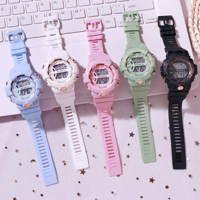 China Cool Soft Alarm Silicone Strap Boys and Girls Synchronize Alarm Clock LED Digital Sports Waterproof Electronic Wristwatch for Teenagers for sale