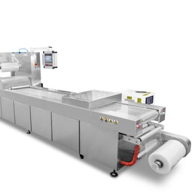 China High Efficiency High Speed Continuous Vacuum Sealing Packaging Machine For Food for sale