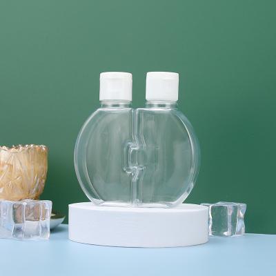 China Unique design 50ml cosmetic promotional good quality double transparent jigsaw bottle with clamshell for sale