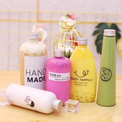 China Beverage Amazon Cover Juice Coffee Bottle Aluminum 200ml 240ml 300ml 500ml Transparent Conical Screen Printing PET Tea Bottle Milk Tea for sale