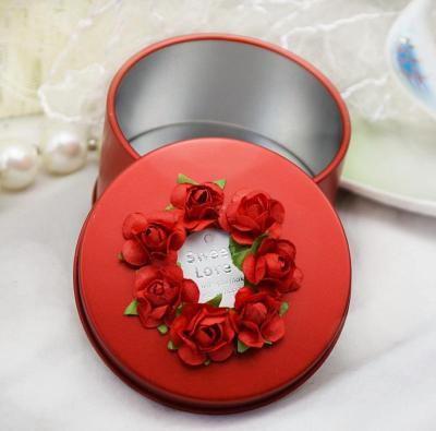 China Emboss/Empty Soft Custom Metal Candy Round Wedding Favor Printing Box Matte Varnishing Tinplate Tin Box for sale