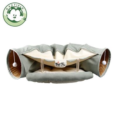 China Viable Disassembly DIY Pet Toys Supplies Four Seasons Shell Cat Cave Tunnel Bed With Bell for sale