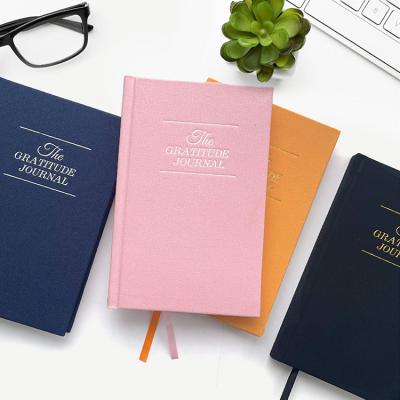 China 2022 New Arrivals Low MOQ Planner 100gsm Pages Fabric Cream Canvas Notebook Eco-Friendly Monthly Weekly Daily Hardcover Journal for sale