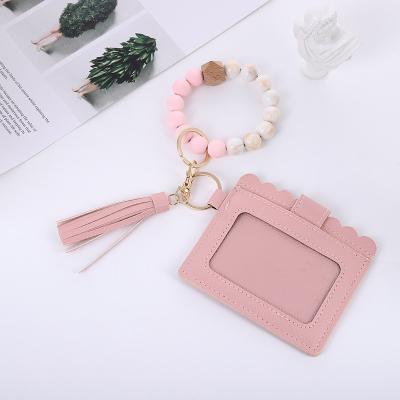 China Eco-friendly wholesale women's main chain bracelet with tassels card holder bracelet women bracelet for sale