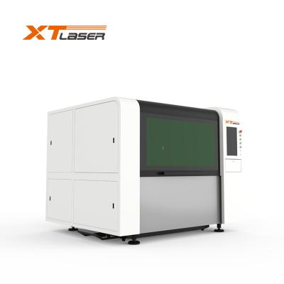 China Laser CUTTING fully enclosed fiber laser cutting machine with hot sale in China for sale