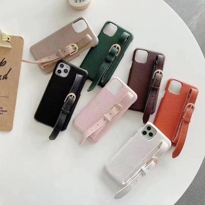 China Custom New LOGO Wrist Strap silod Luxery Protector Genuine Leather Cell Phone Cases For apple iphone 7PLUS X XR10 11 apple 12 pro max for sale