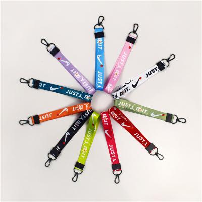 China For Phone Pink Wholesale Designer Earbuds Lanyard Loose Key Chain Wrist Short Loose Printed Lanyard for sale