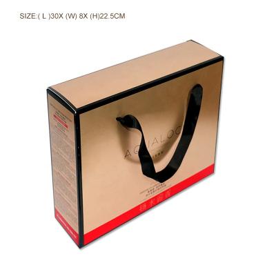 China Gold Recyclable UV Frosting Luxury Kraft Paper Packaging Bags Custom Logo Print for sale