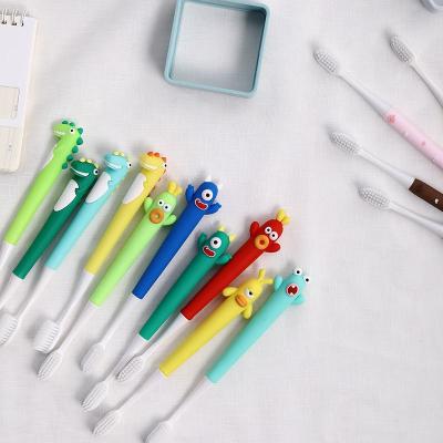 China Baby Toothbrush Cartoon Dinosaur Cute Rabbit Monster Eco-Friendly Soft Stiffened Small Toothbrush For 3-6-12 Years And Up for sale