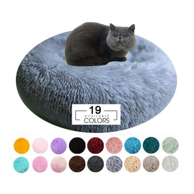 China Fluffy Anti Anxiety Pet Calming Beds Washable Luxury Donut Dog Beds for sale