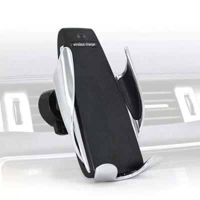 China Smart Infrared Touch Mobile Phone Penguin Sensor Car Phone Holder Qi Auto Fix Fast Wireless Charger For Mobile Phone for sale