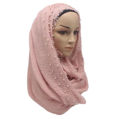 China Muslim Cotton Pearl Bubble Pearl Wrinkle Shawls Drape Fringe Crinkle Muslim Ladies Hijab Scarf For Winter for sale