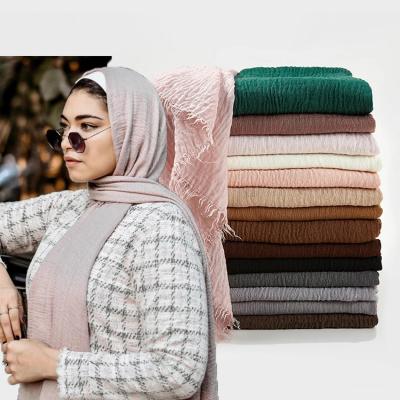 China Women Muslim Solid Scarf Islam Shawl Oversized Head Wraps Simple Arab Muslim Hijab Long Soft Wrinkle Cotton for sale