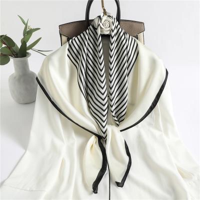 China Matching clothes spring and simple color matching large scarf summer temperament square silk scarf letter for sale