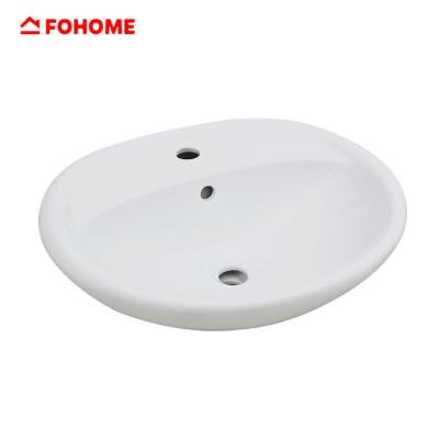 China Modern Cheap Oval Fancy Shape Bathroom Ceramic Sink Lavatory for sale