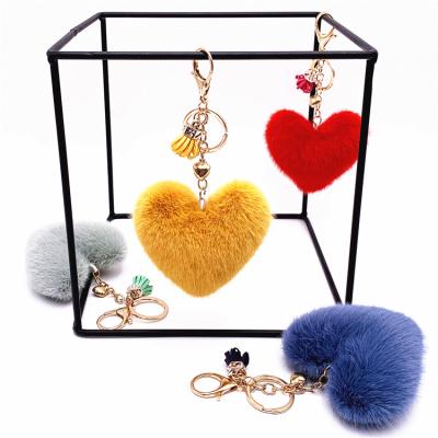 China Cute Heart Shaped Car Key Pendant Fashion Tassel Heart Bag Key Chain Ring Pendant Creative Small Gift for sale