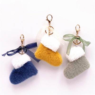 China Cute Fashion Christmas Gift Bag Cartoon Plush Car Pendant Bow Chain Boots Key Chain for sale