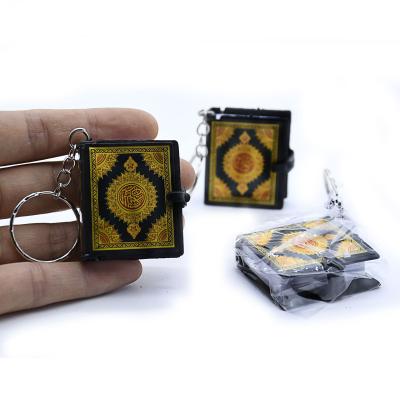 China Fashion Wholesale Miniature The Cover Red Quran Quran Ornaments Religious Pendant Key Chain Green Book Key Chain for sale