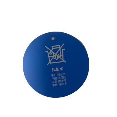 China Custom Hang Circular Tags Clothing Swing Label Waterproof Eco Friendly Garment Caution Label for sale