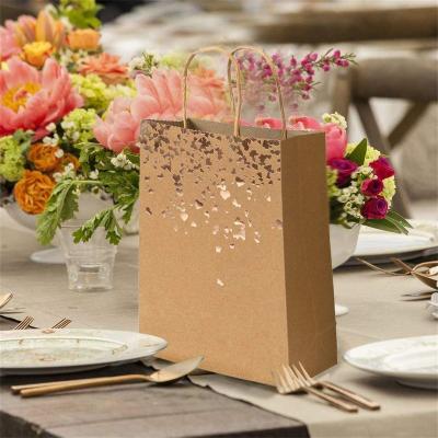 China Hot Sale Recyclable Customized Logo Luxury Durable Personalized Top Quality Kraft Paper Gift Packaging Bags for sale