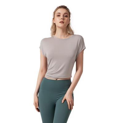 China Breathable Loose Quick-Drying Gym Top For Women Running Sexy Short Sleeve Yoga Split Dress For Women for sale