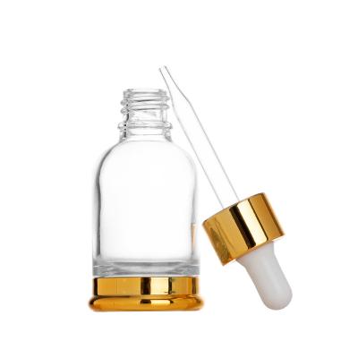 China Newest Design Personal Care Glass Bottle Essential Oils Good Quality Transparent Bottle for sale