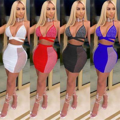 China Autumn breathable women's suit fashion club sexy skirt ironing and drilling back cross band uncovered two-piece set for sale