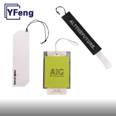 China Viable Luxury Brand LOGO Deboss Printing Apparel Garment Gift Voucher Wrapping Craft Paper Cardboard Swing Hang Tag With String for sale