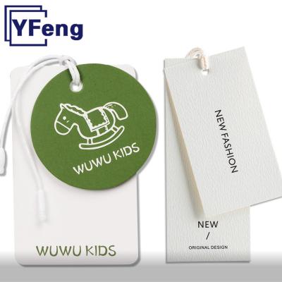 China Sustainable Recycled Brand LOGO Emboss Printing Clothing Garment Gift Card Kraft Paper Cardboard Swing Hang Tag With String for sale