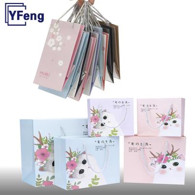 China Wholesale Cheaper Recycled Materials To Emboss Hot Stamping Design Deboss Printing Clean Logo Food White Gift Cardboard Kraft Paper Bag With Handle for sale