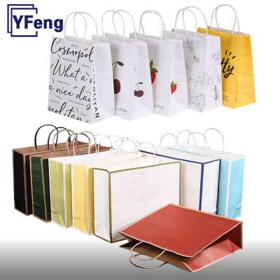 China Cheap Recyclable Emboss Printing Personalizzati Sacchetti Design LOGO Food Wrapping Paper Hot Stamping Shopping Deboss Packaging Bag With Handle for sale