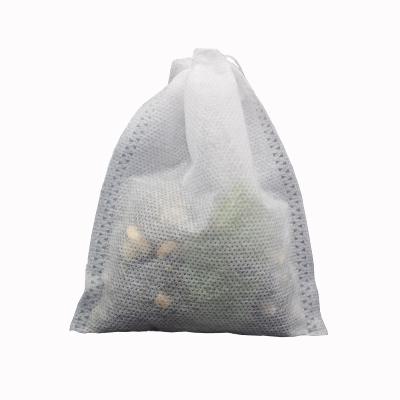 China Coffee And Tea Filter 100 Pcs / Loose Leaf Tea Bag Drawstring Sealing Disposable Nonwoven Filter Bag for sale