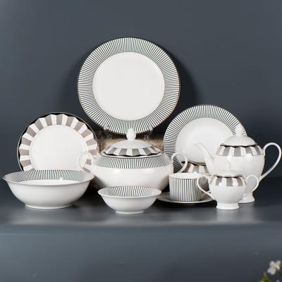 China Sustainable Hotel Weeding Luxury Gold and Black Line Chinese Style Fine Bone China Ceramic Dinnerware Sets for 8 People for sale