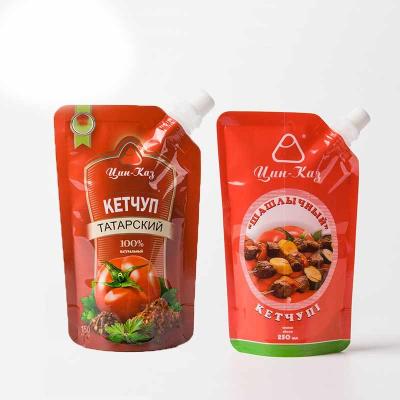 China Premium Food Grade Liquid Food Unhindered Sample Stand Up Spout Pouch Juice Tea Drink Packaging Bags Water Pouch With Carabiner for sale