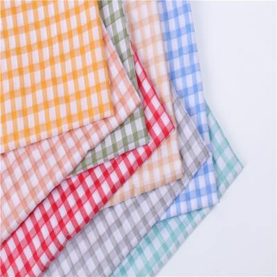 China 2022 Fashions QUICK DRY jacquard polyester yarn-dyed plaid woven rayon fabric for women and kids shirts for sale