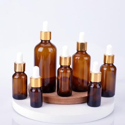 China Wholesale Amber Glass Essential Oil Bottle 30ml serume cosmetic bottle with cosmetic dropper packaging for sale