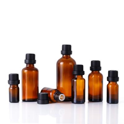 China Wholesale Cosmetic 5ml 15ml 20ml 30ml Amber Glass Essential Oil Bottle With Tamper Evident Child Safe Cap for sale