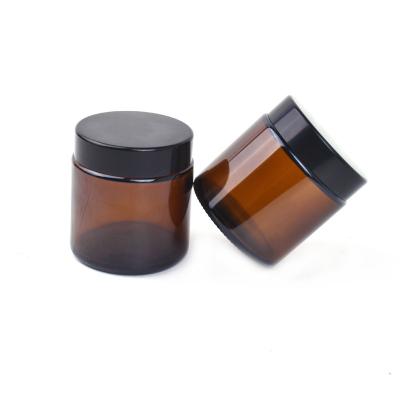 China Cosmetic 2 oz Brown Translucent Refillable Cosmetic Cream Containers 100g Amber Glass Jar For Body Scrub for sale