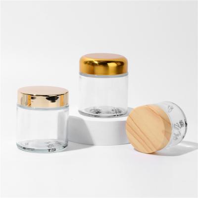 China 50ml frosted glass cosmetic clear cosmetic jars cream glass jar with gold foil stamping 5g 10g 20g 30g 50g 100g 200g also available for sale