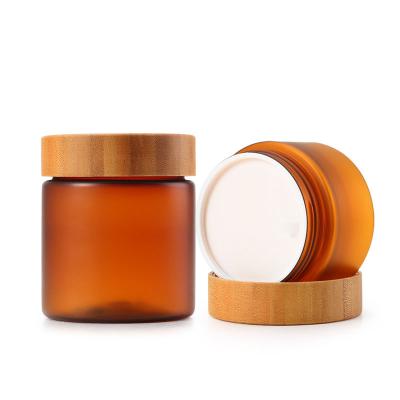 China Leak proof plastic food candy packaging 150ml 250ml amber pet clear frosted plastic cosmetic cream jar with bamboo lid for sale