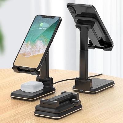 China Foldable Portable Degree Angle Height Adjustable Mobile Phone Radio Holder Rotating Charging Fast Wireless Charger For iPhone for sale