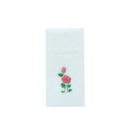 China Custom Printed Logo Rose Flower Pattern Airlaid Paper Napkins With Cutlery Pocket for sale