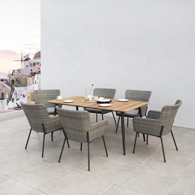 China Modern Outdoor PE Rattan Dining Furniture Set With Wicker Wood Table for sale