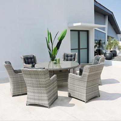 China Modern Aluminum Outdoor Furniture Wicker Dining Table And Chairs Set In 13pcs With Cushion for sale