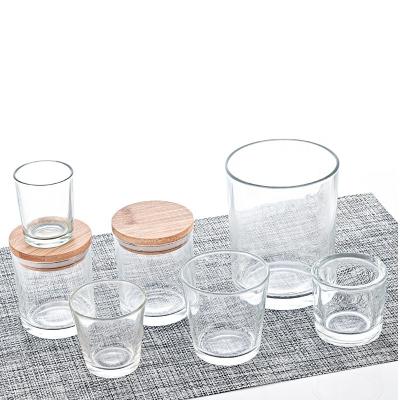 China Modern Glass Candle Jars Custom Elegant Clear Glass Candle Jar With Wooden Lid for sale